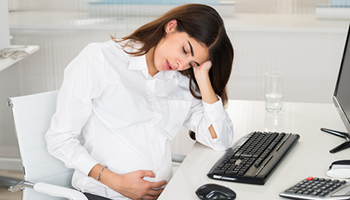 pregnant woman in an office