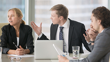 people discussing in a meeting